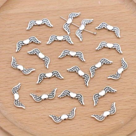 Galanterie: Ozdobný díl andělská křídla 7x20 mm (1ks)
